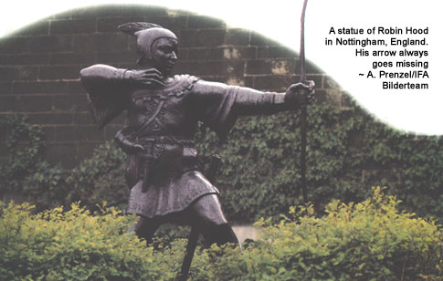 A statue of Robin Hood in Nottingham, England. His arrow always goes missing.