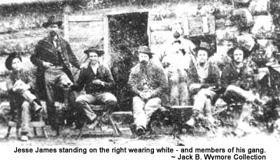 Jesse James standing on the right wearing white - and members of his gang.