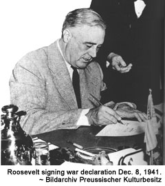 Roosevelt signing war declaration Dec. 8, 1941.